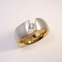 Ring aus 925 Sterling-Silber und 750 Gelbgold mit 0,17 ct...